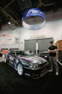 Nissan GT-R R33 at SEMA with Dustin Williams pictured