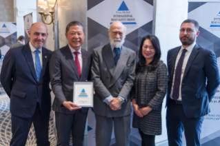 Bridgestone leaders pose with His Royal Highness Prince Michael of Kent and their award at the annual ceremony in December.