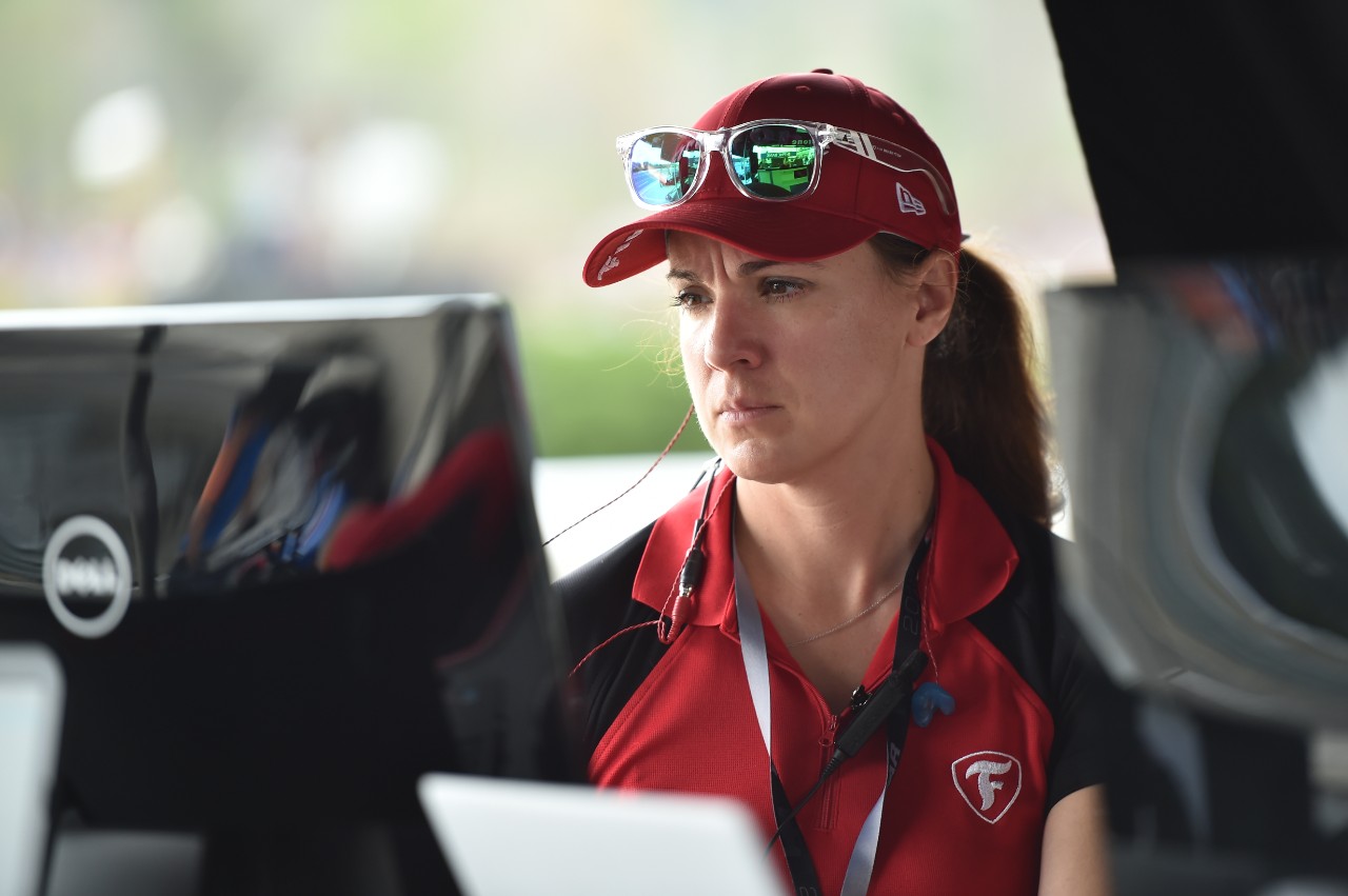 Cara Krostlic in the Firestone Racing pit stand during practice for the Indy 500.