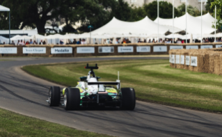 The IAC car nears the finish line of its record-breaking run at Goodwood. 