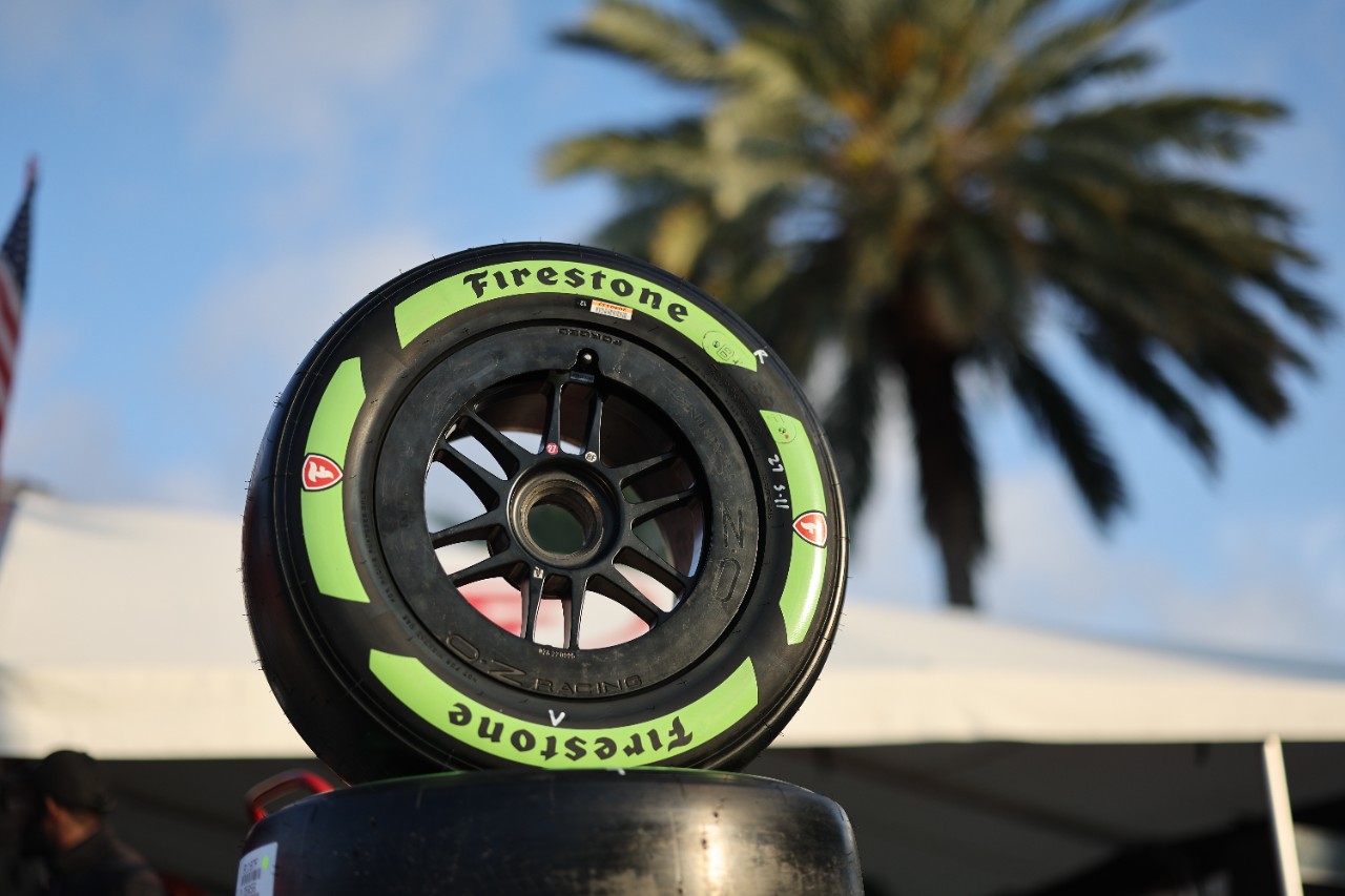 Firestone Firehawk alternate tires with green sidewall markings are used at the Firestone Grand Prix of St. Petersburg. These tires include natural rubber in the sidewall derived from guayule, a desert shrub.